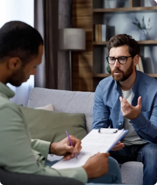 Man meeting with his specialist about his mental health care