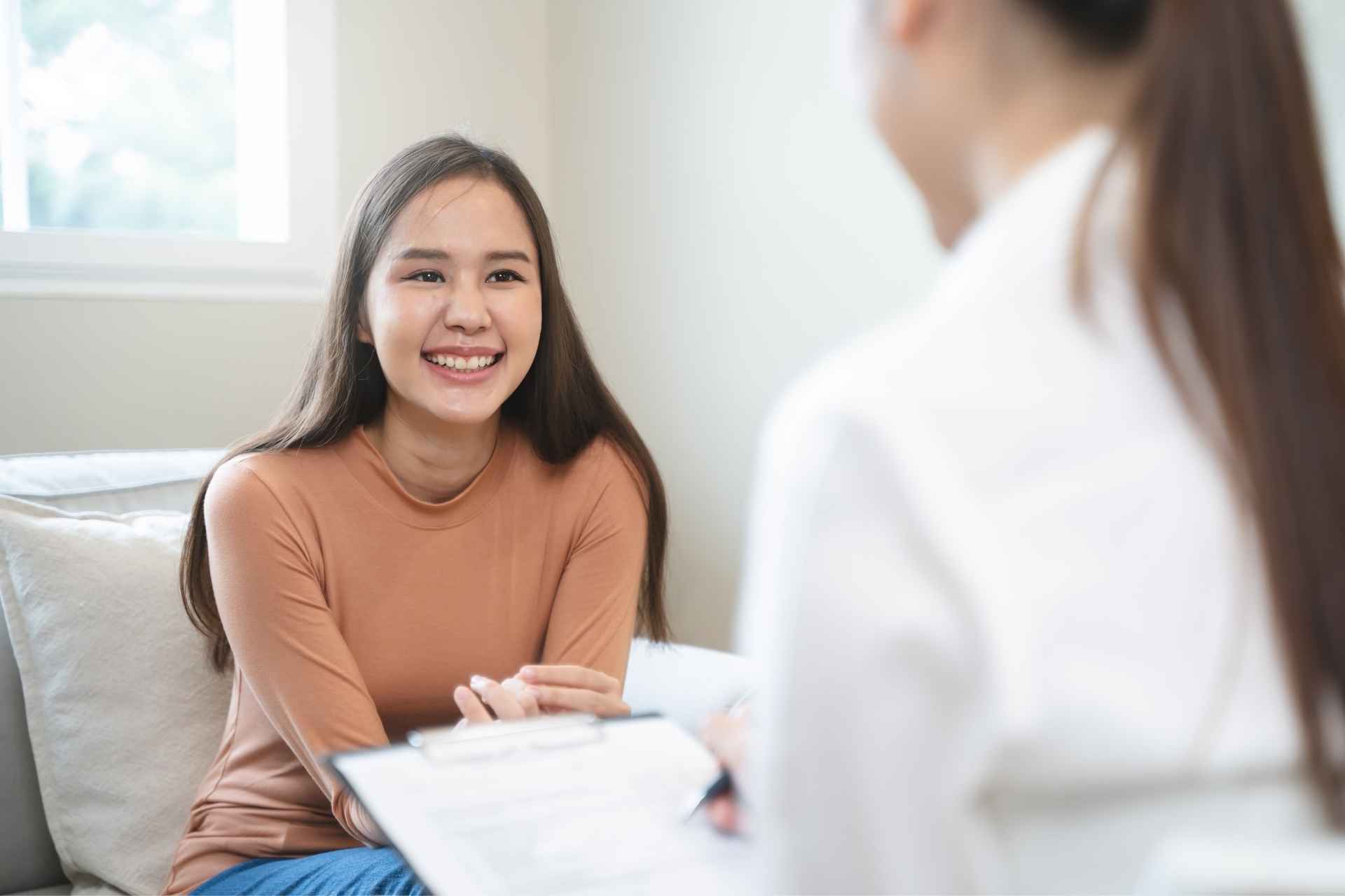 Woman speaking with a therapist during anxiety treatment in Kendall Park, NJ